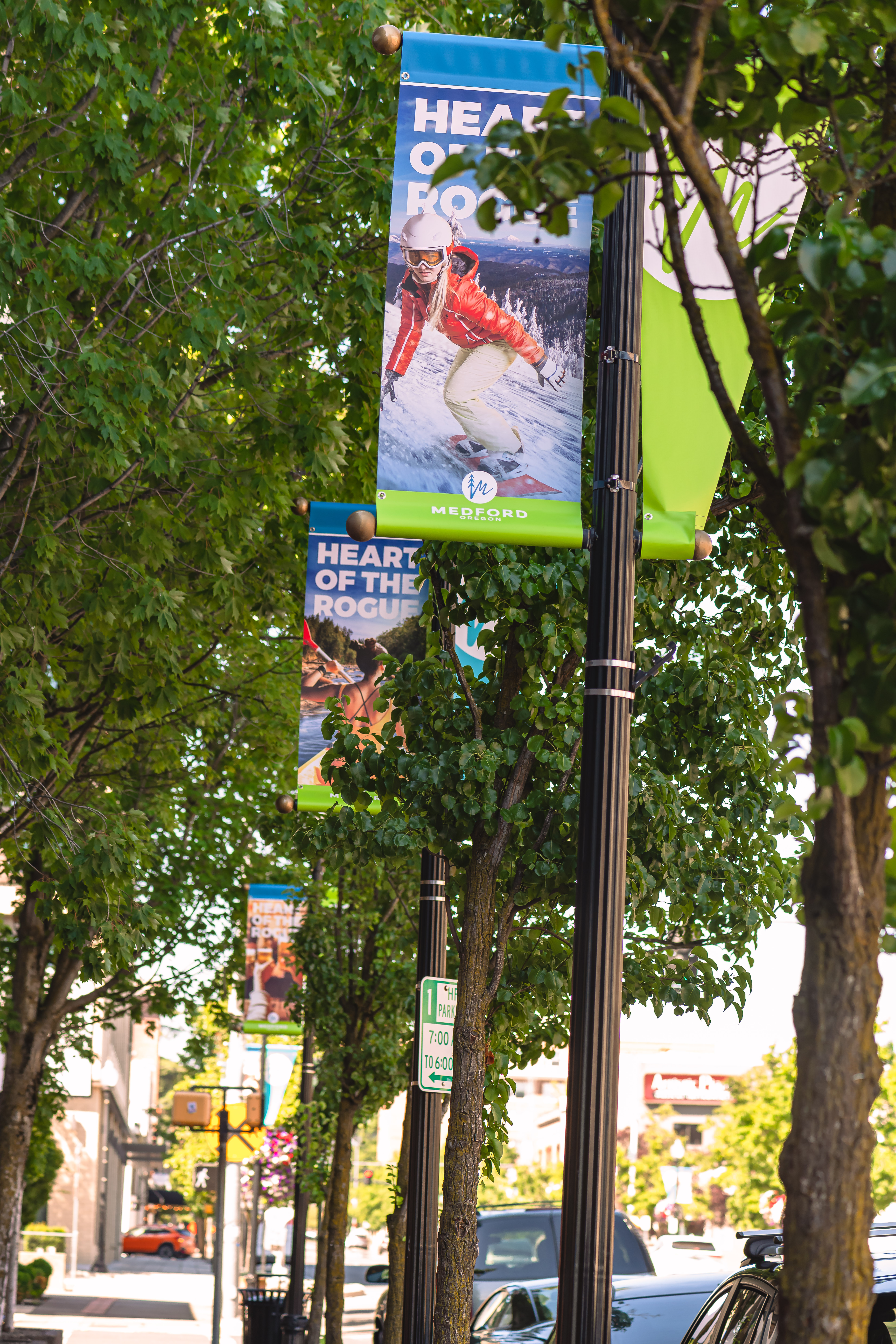 Flags are hung in downtown Medford featuring all the many activities to do in Medford.